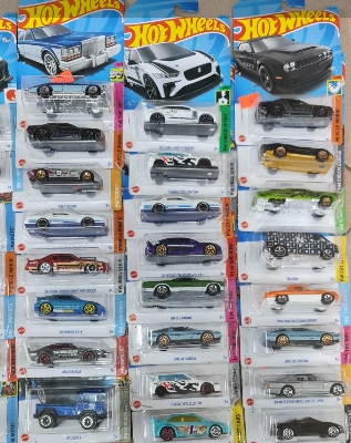 Picture of Hot Wheels new collection 2024 Basic Car H Assortment, 1 Mini Cars in Box Sale, Ages 3 and UpMcLAREN F1 GTR hot wheels made in Malaysia