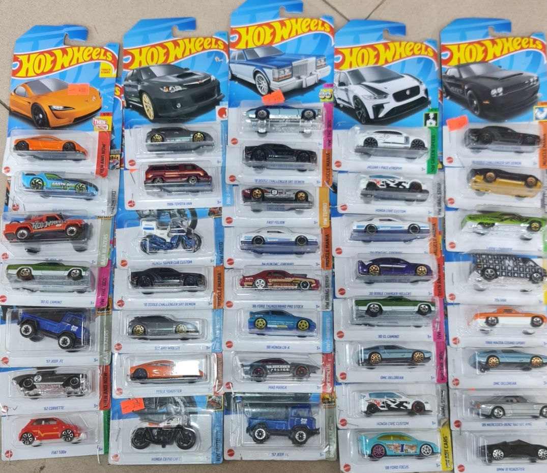 Picture of Hot Wheels new collection 2024 Basic Car H Assortment, 1 Mini Cars in Box Sale, Ages 3 and UpMcLAREN F1 GTR hot wheels made in Malaysia