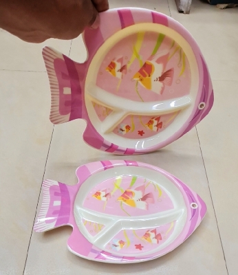 Picture of Our adorable baby fish plate make mealtime a splash with divided sections keep portions organized, while the cute fish design encourages little ones to gobble up their food. Made from safe, food-grade materials, it's perfect for tiny hands