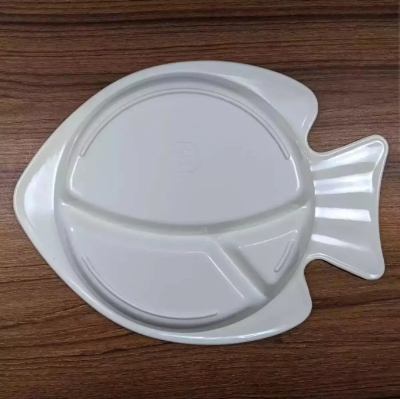Picture of Our adorable baby fish plate make mealtime a splash with divided sections keep portions organized, while the cute fish design encourages little ones to gobble up their food. Made from safe, food-grade materials, it's perfect for tiny hands