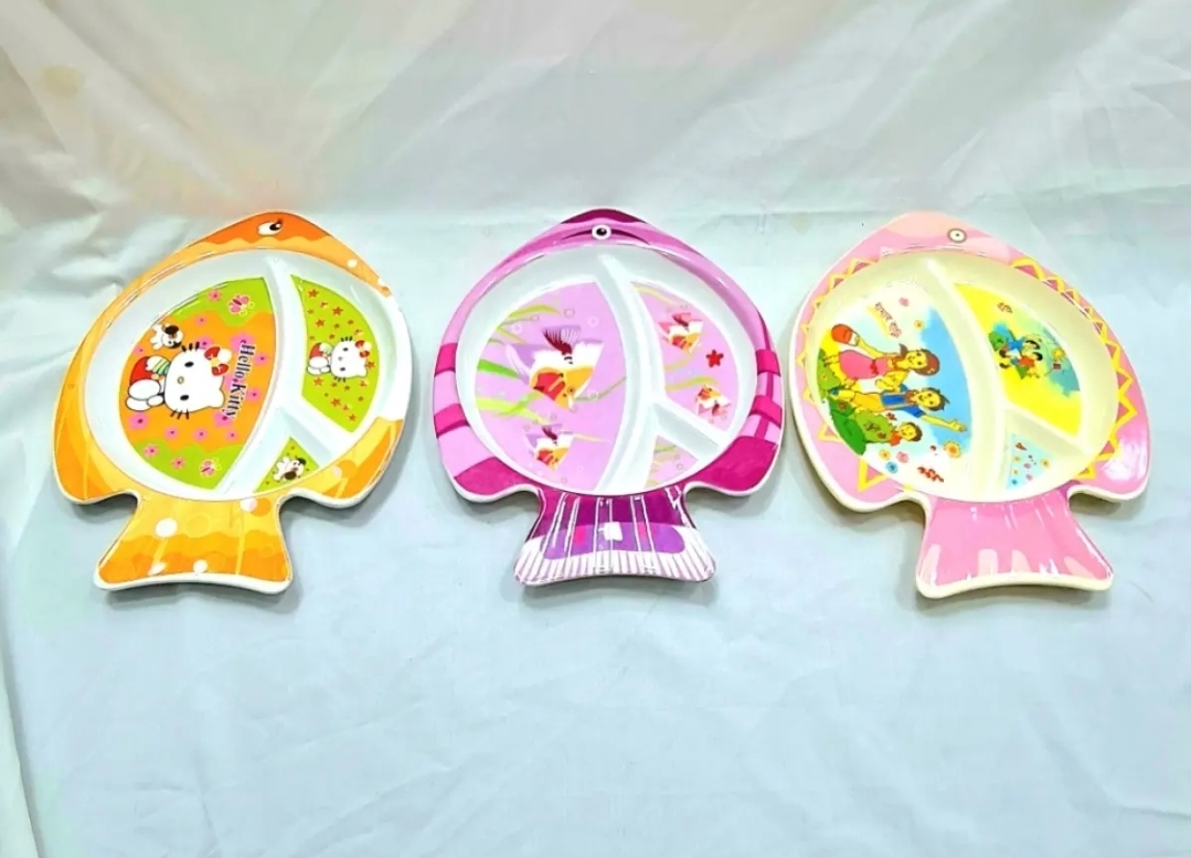 Picture of Our adorable baby fish plate make mealtime a splash with divided sections keep portions organized, while the cute fish design encourages little ones to gobble up their food. Made from safe, food-grade materials, it's perfect for tiny hands