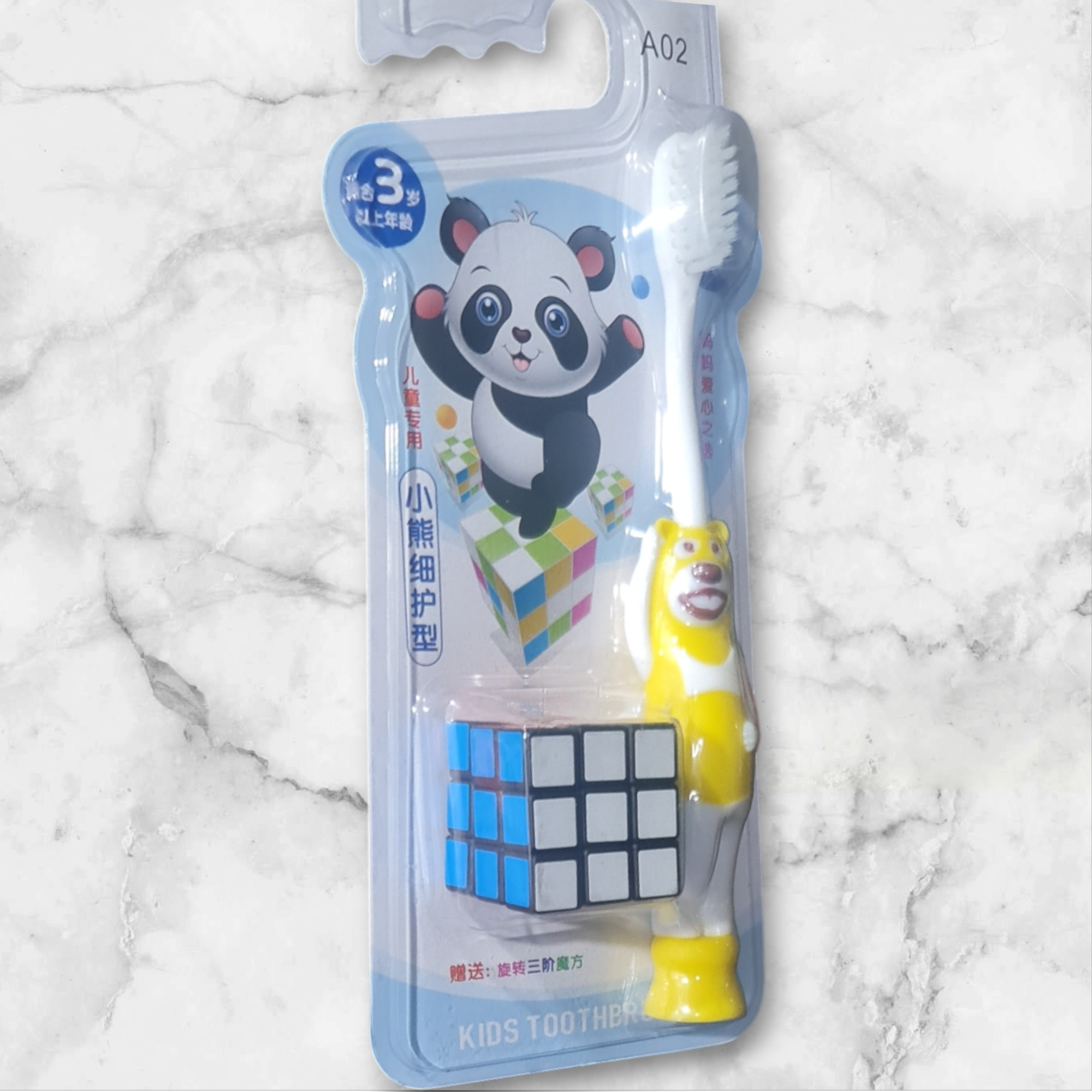 Picture of Kids Toothbrush with Ultra Soft Bristles and Cube Toy Colour may vary