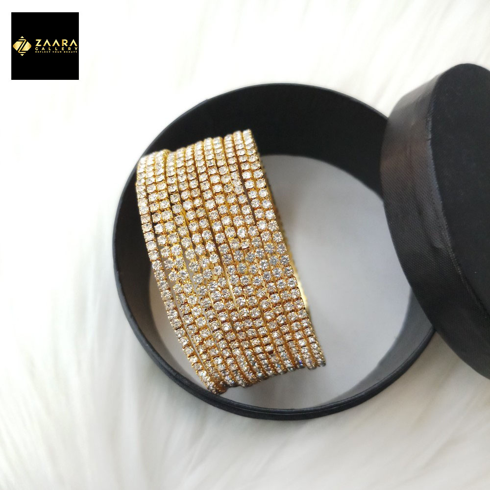 Picture of Golden Metal & White Stone Bangles for Women 12 Pieces (Imported) M-ST2200GOLDWHITE - Bangles