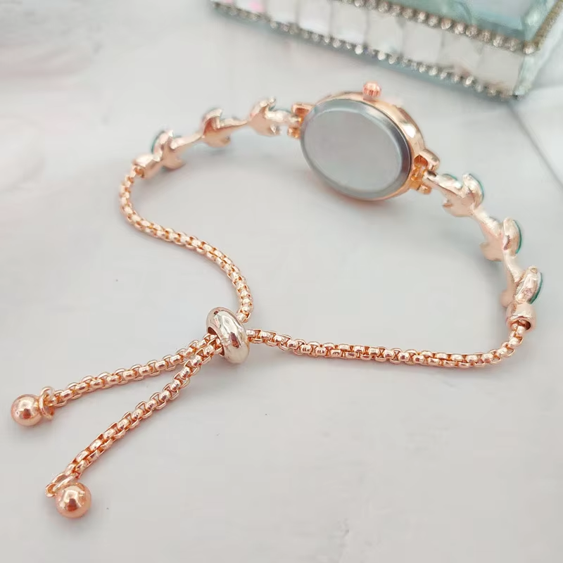 Picture of New Elegant Rhinestone Inlaid for Clover Lady Watches Oval Fashion Quartz Wristwatch Bracelet