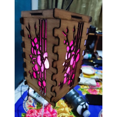 Picture of wooden hanging lamp with lighting for decorative look Picture of wooden hanging lamp with lighting for decorative look