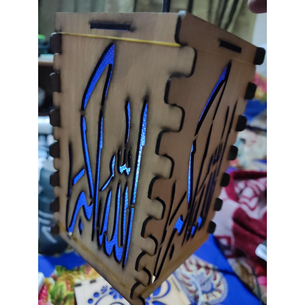 Picture of wooden hanging lamp with lighting for decorative look Picture of wooden hanging lamp with lighting for decorative look