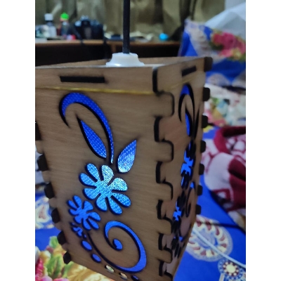 Picture of wooden hanging lamp with lighting for decorative look Picture of wooden hanging lamp with lighting for decorative look