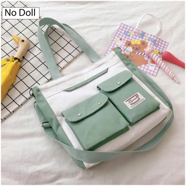 Picture of Canvas shoulder bag with dual front pocket ladies bag, girls bag, hand bag and college bag | Women bag collection 2025