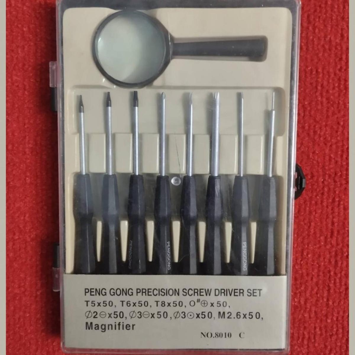 Picture of 8 In 1 Set 8010 SCREWDRIVER Repair Tool Sets Kit 9Pcs Screwdriver Bits With Multipurpose Handle Instrument Stainless Steel Precision 8 In 1 Screwdriver With Magnifier 
