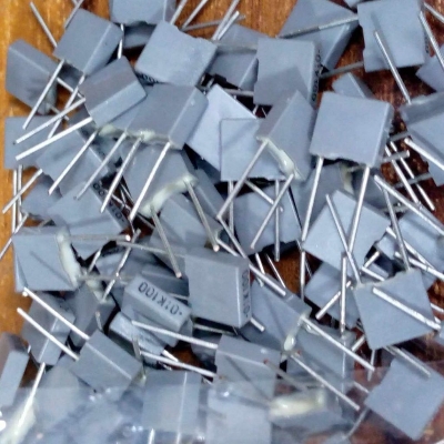 Picture of 10Pcs - BOX TYPE 10nF 103J 0.01uf 100VAC Electric Power Polypropylene Metal Film Box Capacitor Axial Film Molded 100nF 100VAC Capacitors 2 Pin Leads Connections Leg