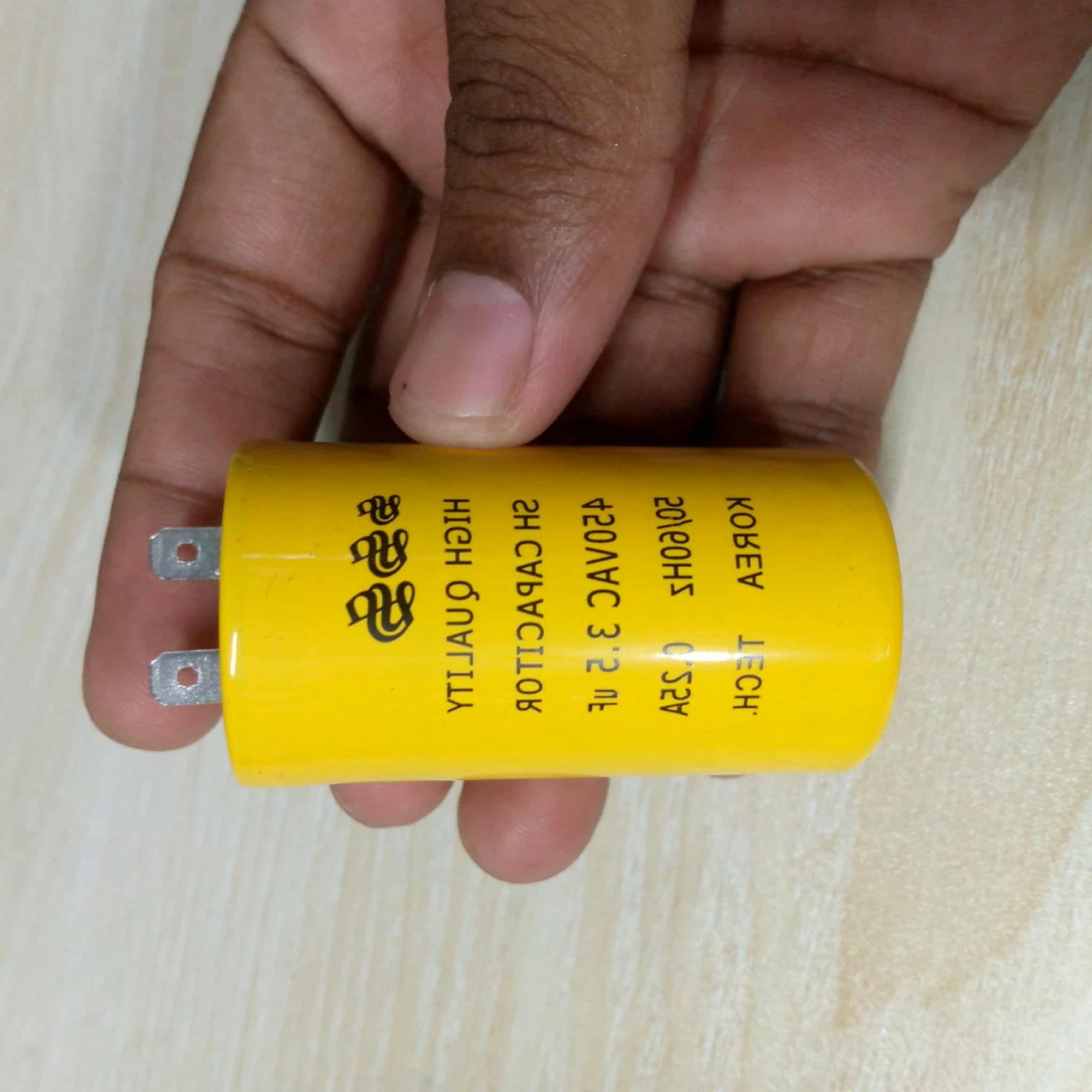 Picture of KOREA TECH High Quality 3.5uF 50Hz 60Hz 0.25A 450VAC Capacitor ORIGINAL 3.5uF Celling Fan Capacitor 2 Pin Leads 3.5uF Capacitor 3.5uF Fan Capacitor