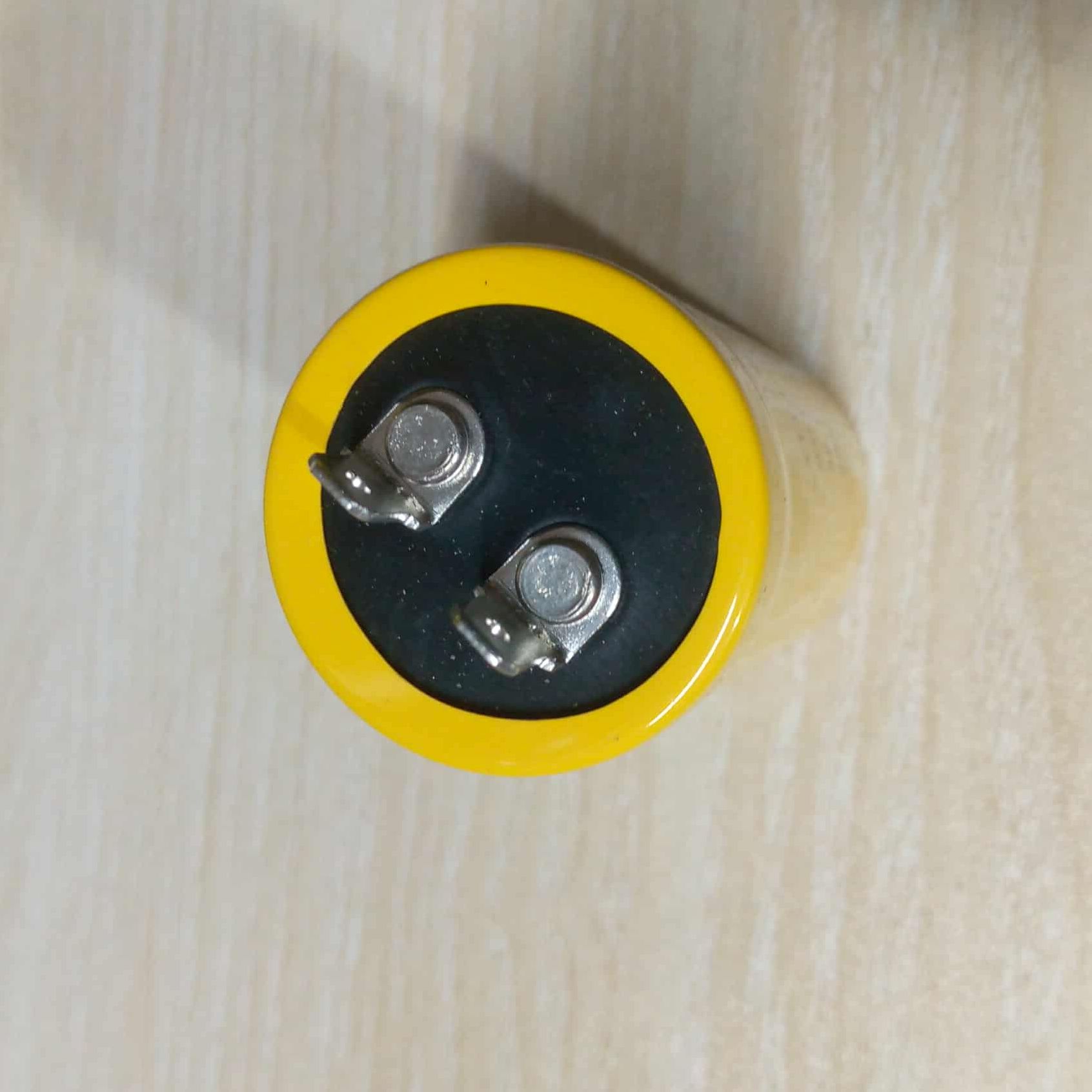 Picture of KOREA TECH High Quality 3.5uF 50Hz 60Hz 0.25A 450VAC Capacitor ORIGINAL 3.5uF Celling Fan Capacitor 2 Pin Leads 3.5uF Capacitor 3.5uF Fan Capacitor
