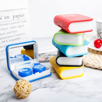 Picture of Eyekan Exclusive Portable Contact Lens Storage Kit with Tweezer, Applicator, Mirror & Solution Bottle. Book Travel Kit Box For All Kind Of Contact Lens. #eyekanbook