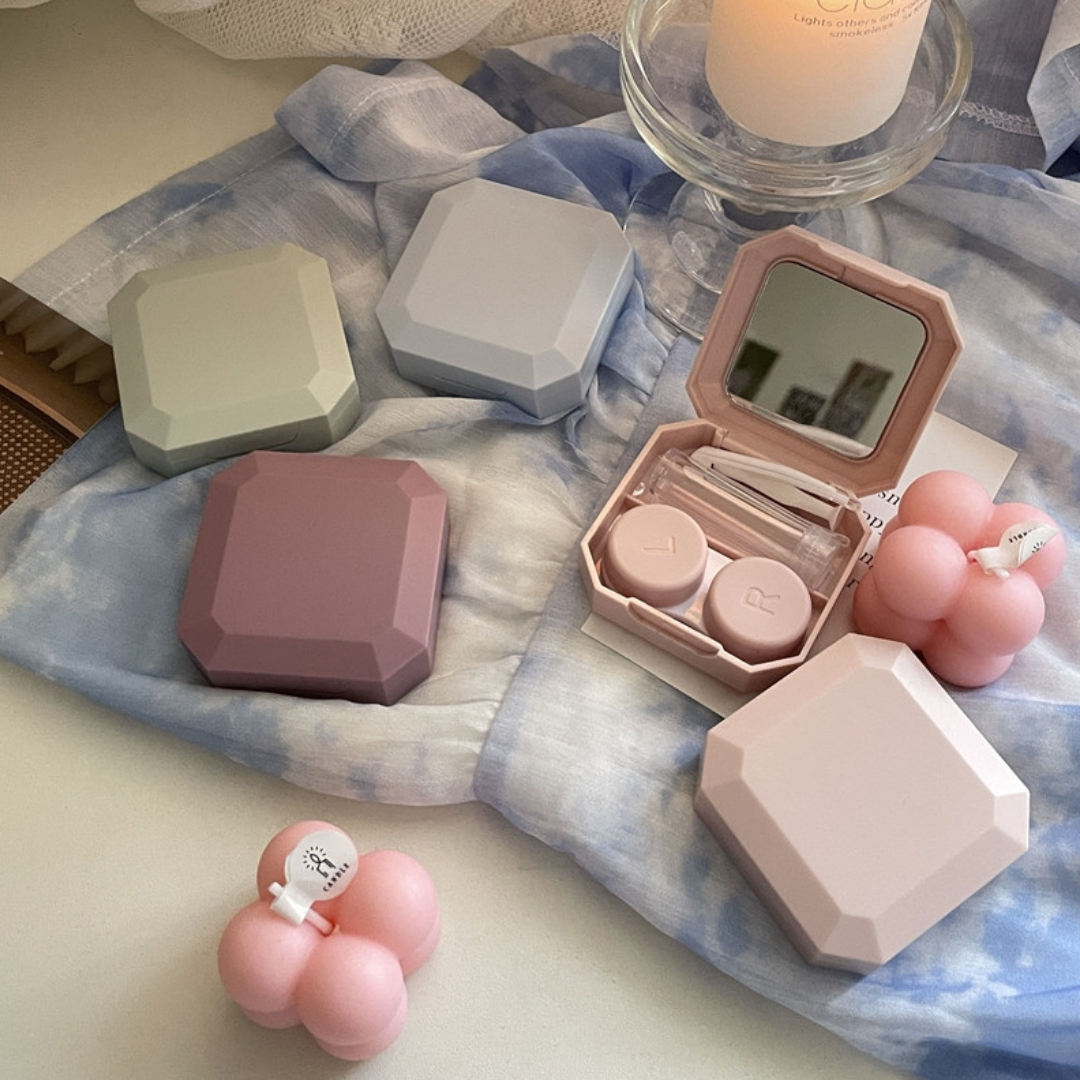 Picture of New Portable Pink Diamond Shape Contact lences Box Holder with Tweezers Remover Tool Solution Bottle Kit for Daily Outdoor Use,tour & travel. New design and Authentic quality Travel Kit Of all type Of Contact lens. #diamondkit