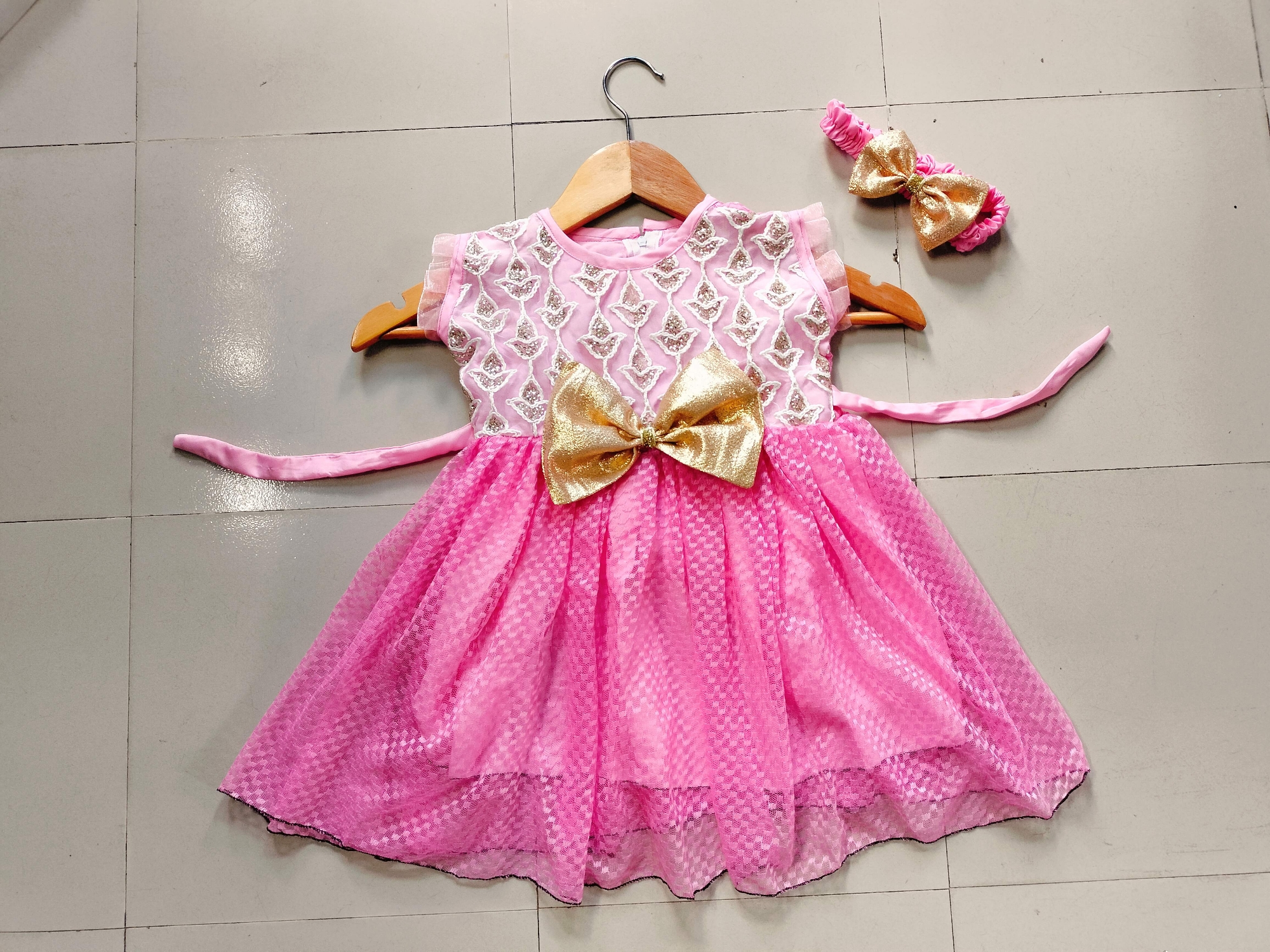 Picture of Baby girls fashionable beautiful party dress for 0 to 7 years babies