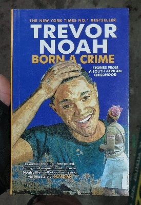 Picture of Born a Crime: Stories from a South African Childhood by Trevor Noah (Yellowish - Paperback)