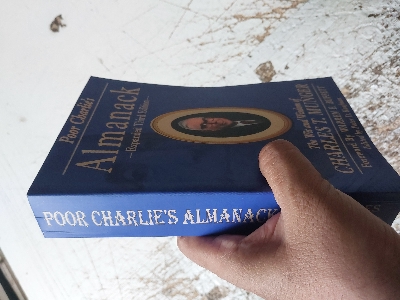 Picture of Poor Charlie's Almanack: The Wit and Wisdom of Charles T. Munger, Expanded Third Edition | Paperback