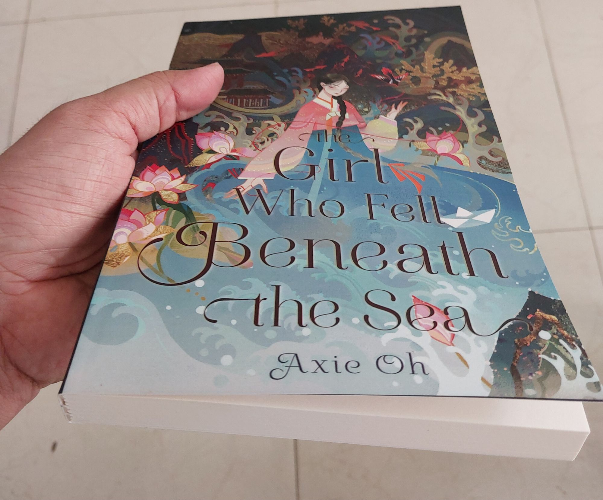 Picture of The Girl Who Fell Beneath the Sea Book by Axie Oh