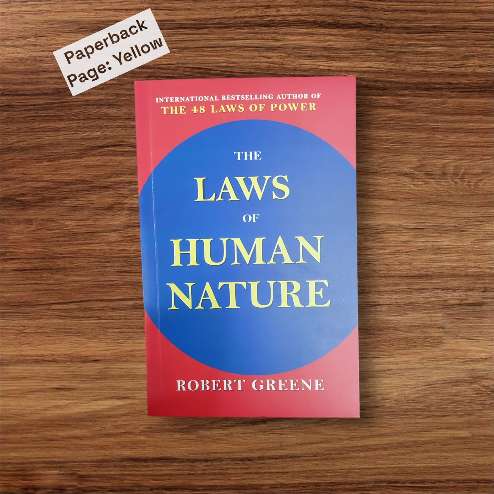 Picture of The Laws of Human Nature by Robert Greene - Yellow - Paperback