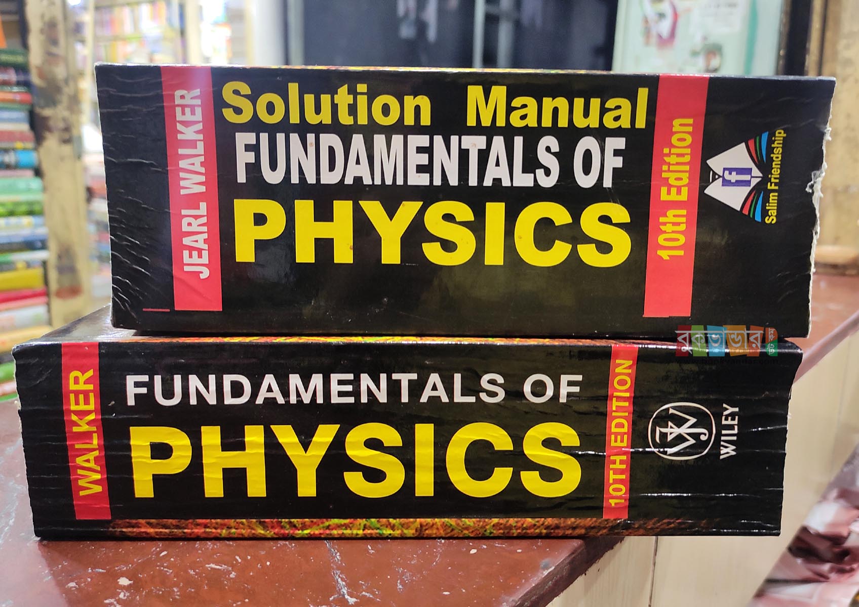 Picture of Fundamental of Physics (10th Edition) and Solution Manual by David Halliday & Robert Resnick (2 Books)