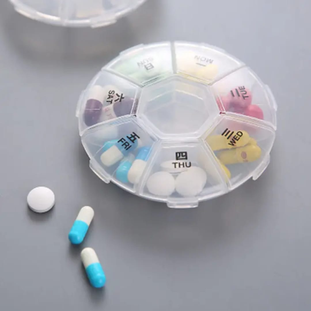 Picture of 7 Compartments Portable Round Mini Plastic Pill Box Medicine Box Travel Pill Storage Case 7 Days Weekly Pill Organizer