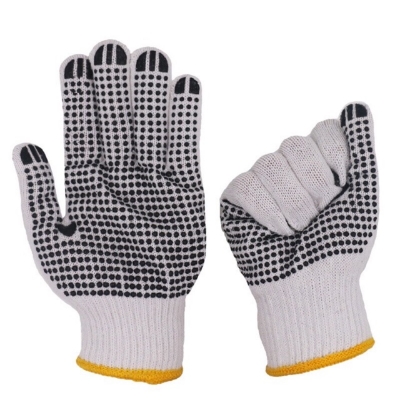 Picture of Knitted cotton and PVC dotted hand gloves are ideal for various tasks including construction, industrial work, welding, kitchen activities, and gardening. This product comes in a package of one pair, providing a reliable grip and protection while ensuring