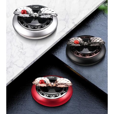 Picture of Car Perfume Ornaments Creative Solar Rotation Leaf Car Aromatherapy Air Fresher Alloy Fragance Diffuser Car Decoration