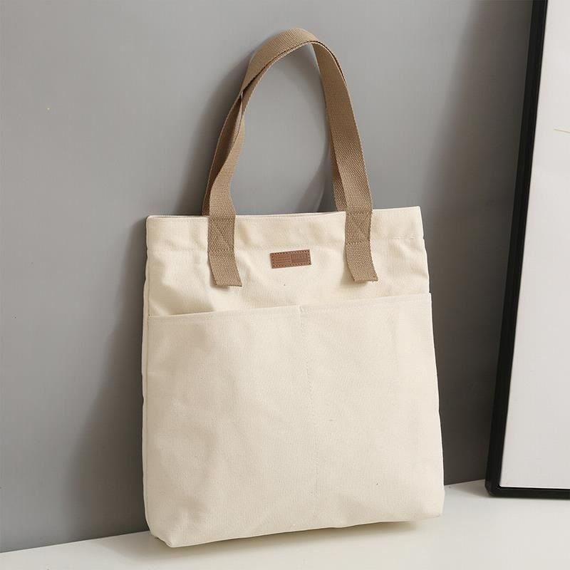 Picture of TAG Lifestyle Canvas Tote Bag/Fashionable Top Handle Off White Color With 2 Big Outside Pocket and Zipper Enclosure for girls For University/College/Trendy Fashionable Women