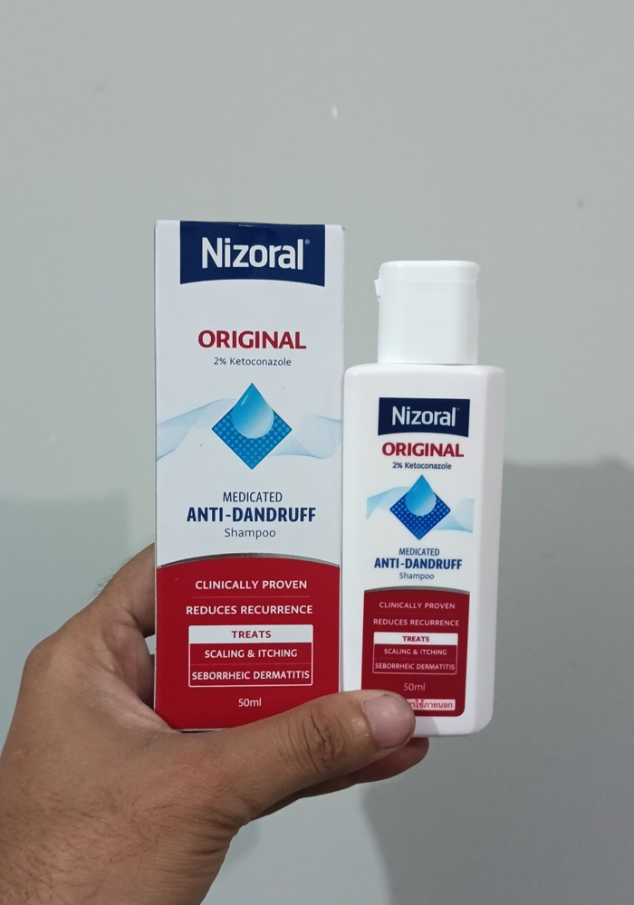 Picture of 50 ml Nizoral Medicated Anti - Dandruff shampoo International Thailand product used for male female