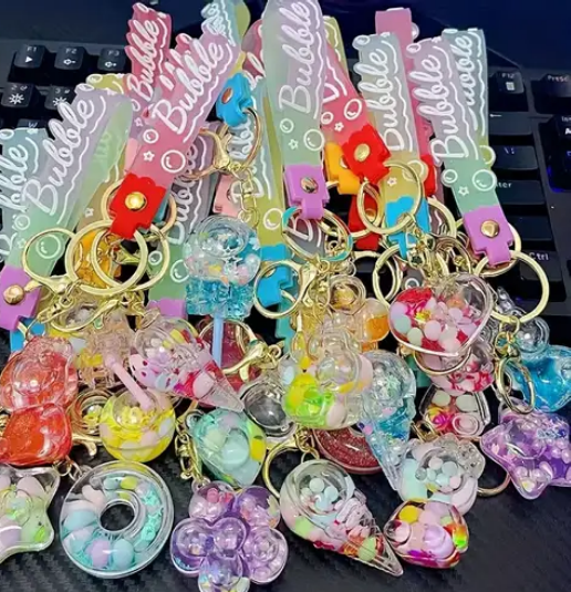 Picture of Creative Keychain Luxury Floating Key Ring New Key Ring Bag Pendant Bag Pendant Keyfob Cute Keychain