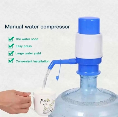 Picture of Hand press manual water pump dispenser - Manual Water Pump For Bottle - Easily Dispense Water From Bottles With This Manual Water Pump Dispenser - Providing Convenience For Your Home Or Office Picture of Hand press manual water pump dispenser - Manual Water Pump For Bottle - Easily Dispense Water From Bottles With This Manual Water Pump Dispenser - Providing Convenience For Your Home Or Office