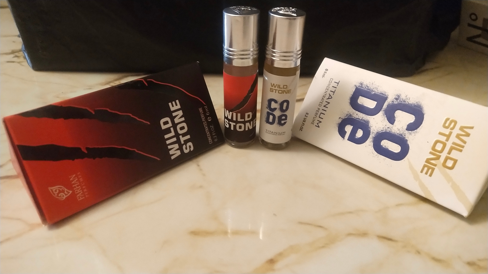 Picture of Combo Wild Stone and Wild Stone Code by al Farhan concentrated perfume oil attar non alcohol - 6ml Picture of Combo Wild Stone and Wild Stone Code by al Farhan concentrated perfume oil attar non alcohol - 6ml
