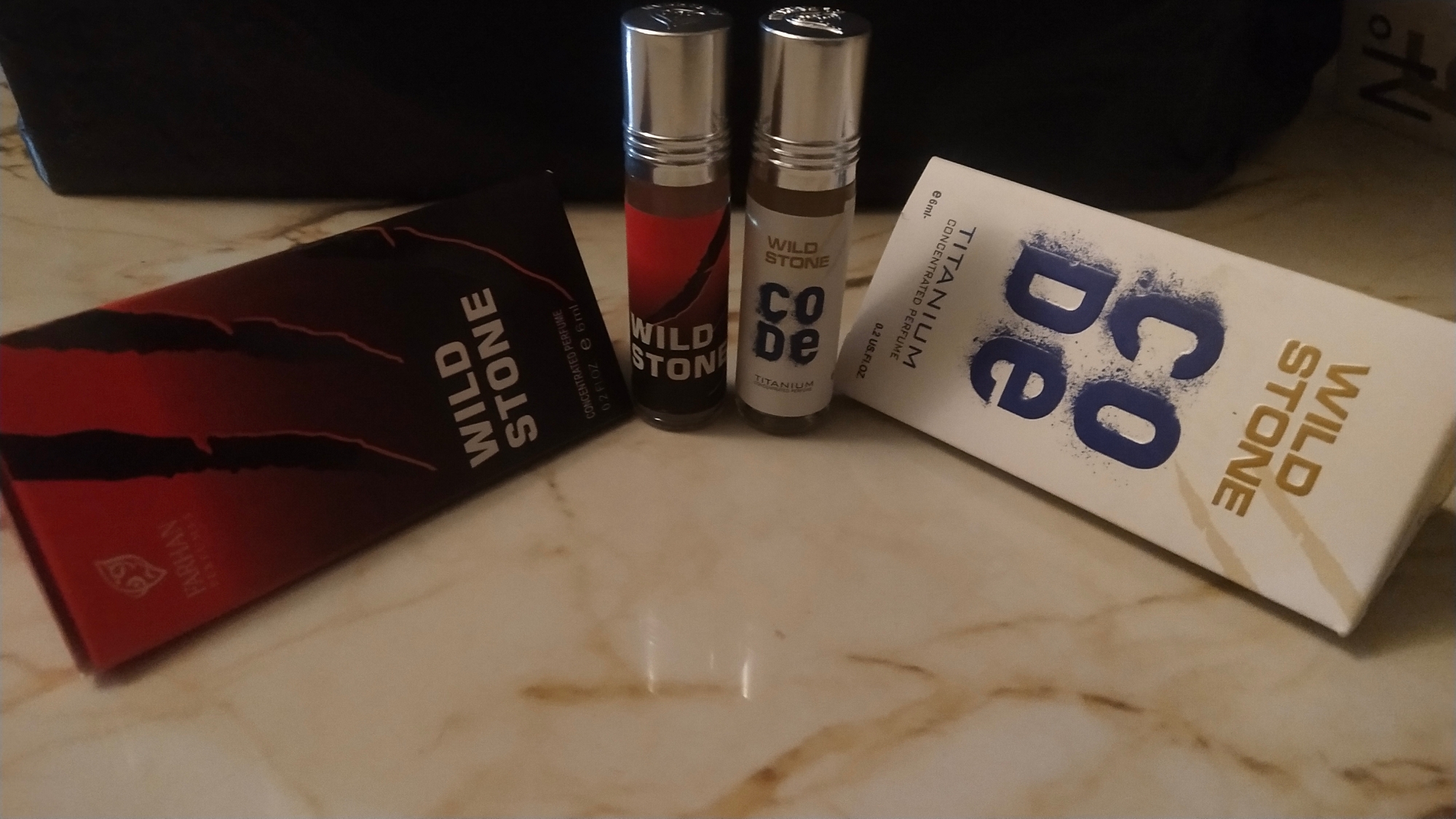 Picture of Combo Wild Stone and Wild Stone Code by al Farhan concentrated perfume oil attar non alcohol - 6ml Picture of Combo Wild Stone and Wild Stone Code by al Farhan concentrated perfume oil attar non alcohol - 6ml