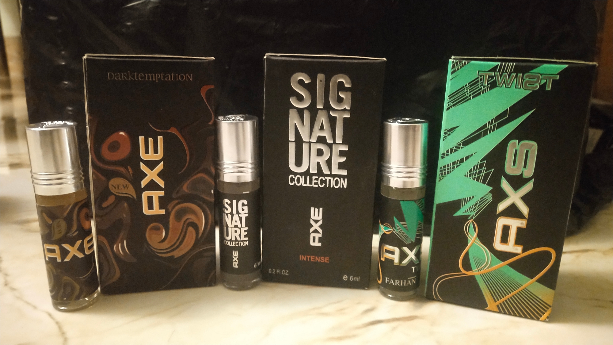 Picture of Combo of A.X.E Signature,  A.X.E Twist &  A.X.E Dark Temptation  By Al Farhan Concentrated Perfume Oil Long Lasting Fragrance - 6ml+6ml+6ml Picture of Combo of A.X.E Signature,  A.X.E Twist &  A.X.E Dark Temptation  By Al Farhan Concentrated Perfume Oil Long Lasting Fragrance - 6ml+6ml+6ml
