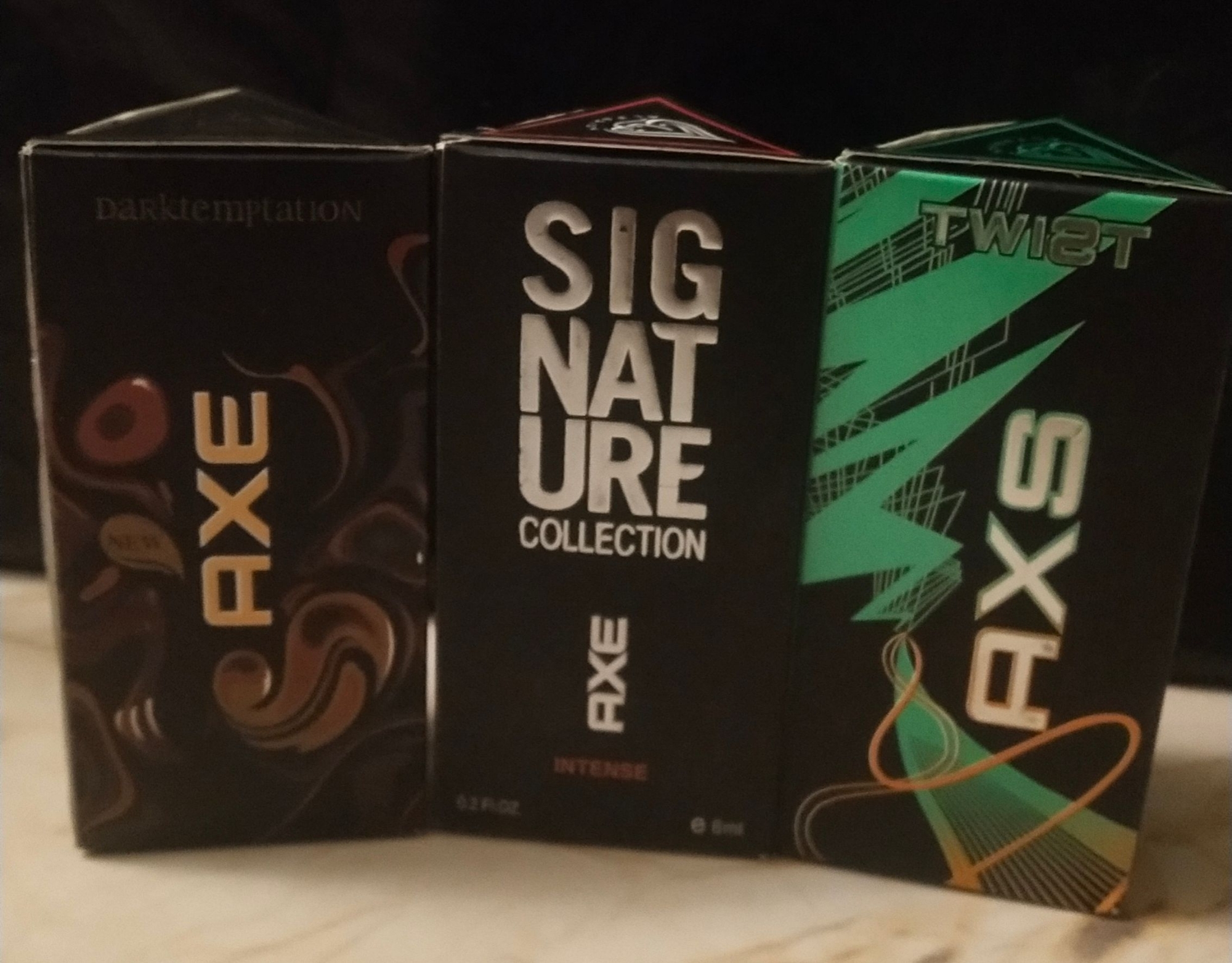 Picture of Combo of A.X.E Signature,  A.X.E Twist &  A.X.E Dark Temptation  By Al Farhan Concentrated Perfume Oil Long Lasting Fragrance - 6ml+6ml+6ml Picture of Combo of A.X.E Signature,  A.X.E Twist &  A.X.E Dark Temptation  By Al Farhan Concentrated Perfume Oil Long Lasting Fragrance - 6ml+6ml+6ml