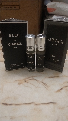 Picture of Combo pack of Sauvage and Blue de Chanel concentrated perfume oil by Al Farhan Picture of Combo pack of Sauvage and Blue de Chanel concentrated perfume oil by Al Farhan