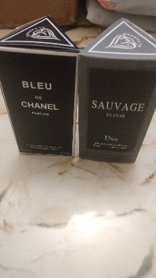 Picture of Combo pack of Sauvage and Blue de Chanel concentrated perfume oil by Al Farhan Picture of Combo pack of Sauvage and Blue de Chanel concentrated perfume oil by Al Farhan