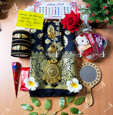 Picture of Exclusive Katan Saree Combo Gift Set - Which Contains  Which Contains Saree Necklace Earrings Bangles Mehedi Mirror Kitkat Tip Love Chocolate Box with Doll Rose Gazra Chirkut and More