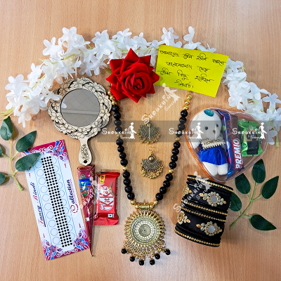 Picture of Exclusive Katan Saree Combo Gift Set - Which Contains  Which Contains Saree Necklace Earrings Bangles Mehedi Mirror Kitkat Tip Love Chocolate Box with Doll Rose Gazra Chirkut and More