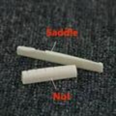 Picture of Acoustic guitar pillow saddle upper string  bridge white guitar accessories