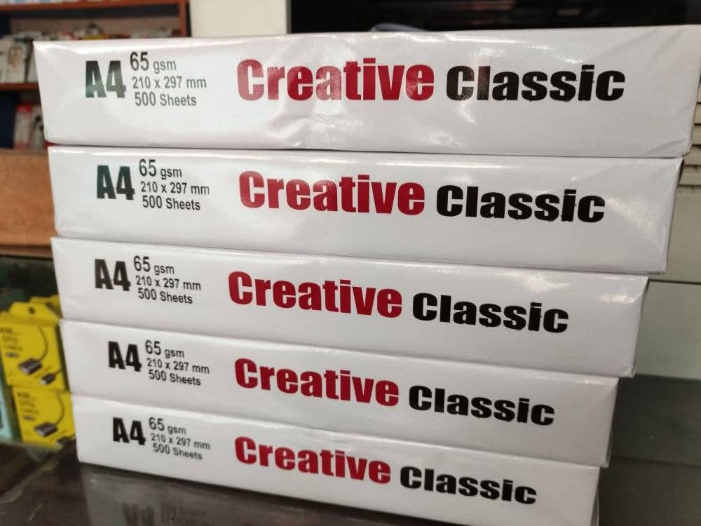 Picture of A4 paper 65 gsm 100 Pcs High Quality Printing and Photocopy paper.