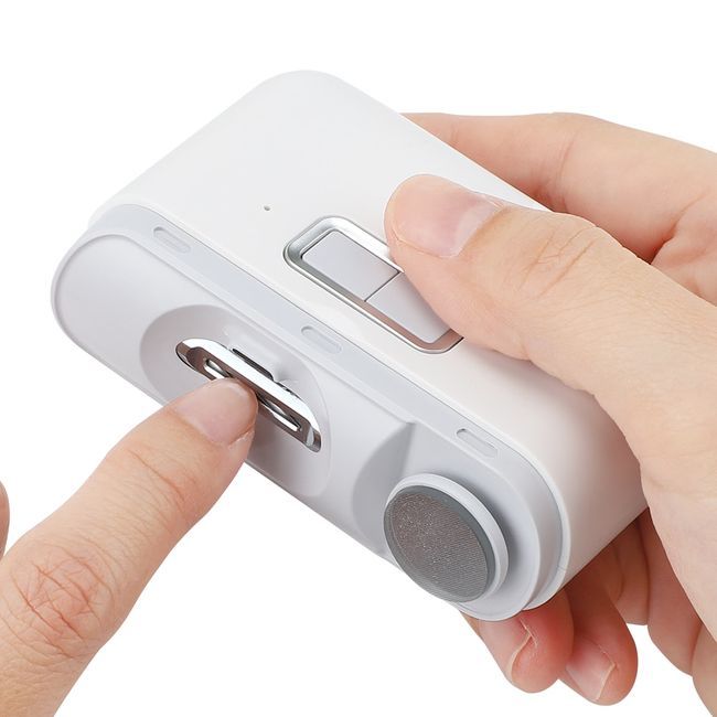 Picture of SHOWLON Electric Nail Clipper LQ-DDZJD01  1 year official warranty - White