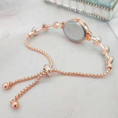 Picture of New Elegant Rhinestone Inlaid for Clover Lady Watches Oval Fashion Quartz Wristwatch Bracelet (Gold )