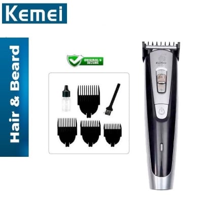 Picture of Kemei KM 9050 Titanium Blade 4 comb Professional Trimmer and Hair clipper for men