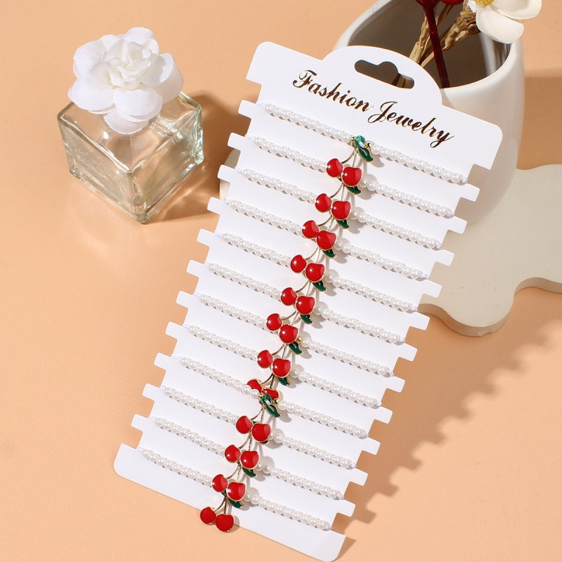 Picture of fashionable imitation pearl beaded red cherry strawberry pendant woven sweet ladies' bracelet