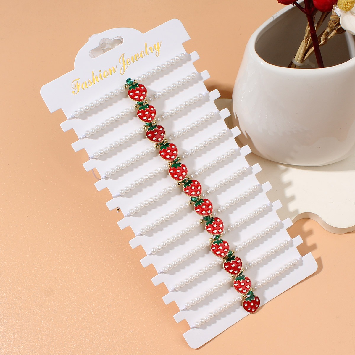 Picture of fashionable imitation pearl beaded red cherry strawberry pendant woven sweet ladies' bracelet