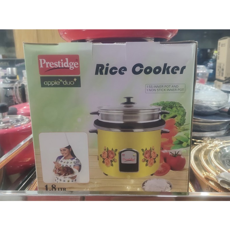 Picture of Prestige 1.8-liter automatic electric rice cooker with a double pot (one stainless steel and one non-stick). Key features include: - Red