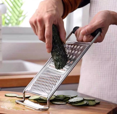 Picture of Stainless Steel Multi-Function| Potato Grater Kitchen Utensils Peel Cutter| Ideal for Vegetables Fruits Orange Chocolate Nuts Ginger - Steel