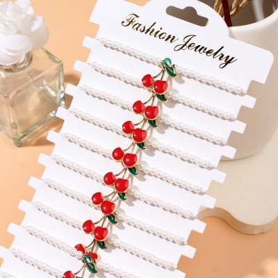 Picture of fashionable imitation pearl beaded red cherry strawberry pendant woven sweet ladies' bracelet