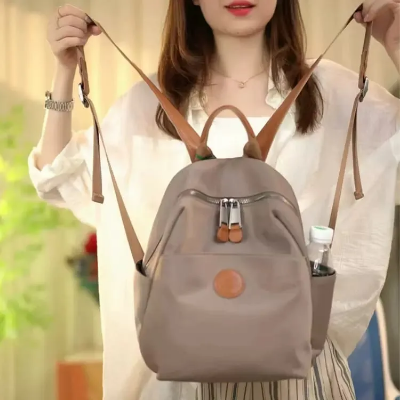 Picture of 2025 New Hot Women's Backpacks Designer High Quality Soft Nylon Simple Fashion Bag(khaki)